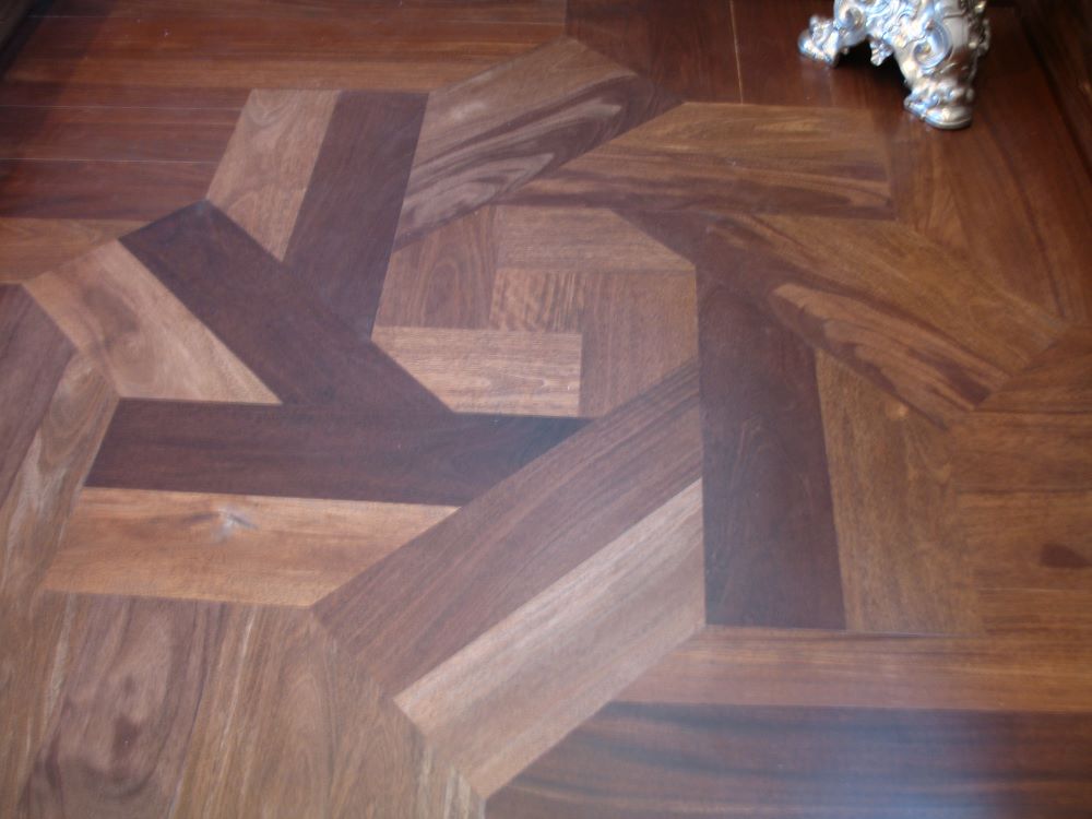 eight pointed star inlay on two landings. custom stairs